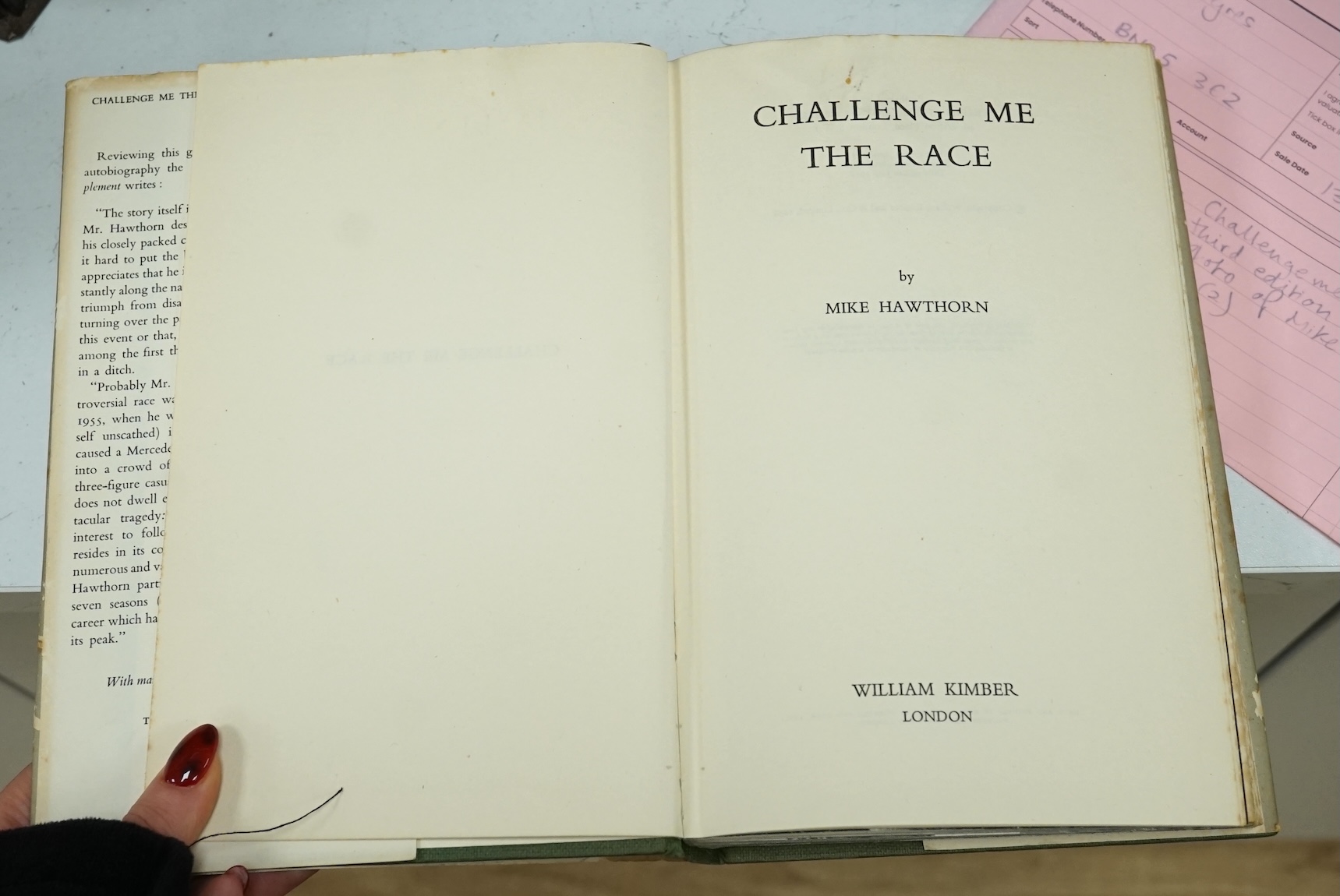 Mike Hawthorn, Challenge me the Race, signed third edition hardback book, together with a framed photograph of Mike Hawthorn, and a press photo of Mike Hawthorn and Stirling Moss (3) Condition - fair